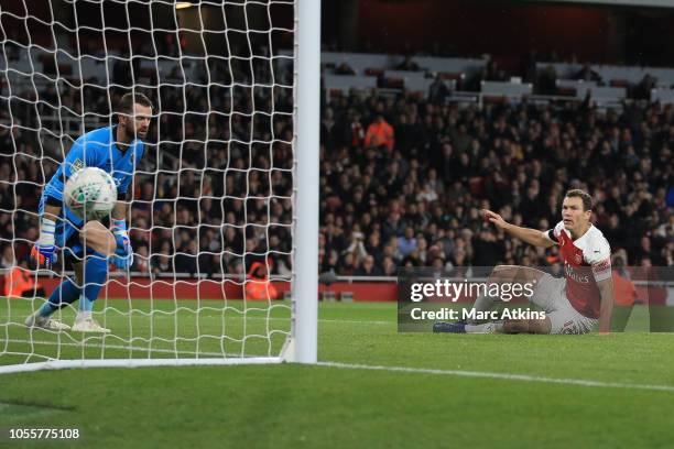 Stephan Lichtsteiner of Arsenal scores the opening goal during the Carabao Cup Fourth Round match between Arsenal and Blackpool at Emirates Stadium...