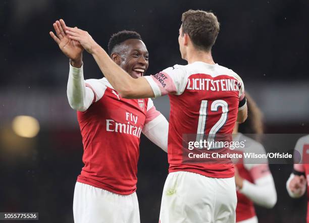 Stephan Lichtsteiner of Arsenal celebrates scoring the opening goal with Danny Welbeck of Arsenal during the Carabao Cup Fourth Round match between...