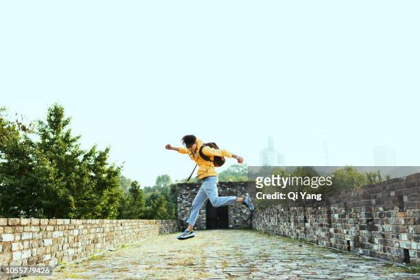 men visiting the city wall of nanjing, china - leap forward stock pictures, royalty-free photos & images
