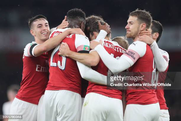Arsenal celebrate the opening goal of Stephan Lichtsteiner of Arsenal during the Carabao Cup Fourth Round match between Arsenal and Blackpool at...