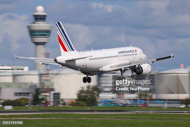 Air France Airbus A319-100 with registration F-GRHE landing at Amsterdam Schiphol International Airport in The Netherlands. The aircraft is flying...