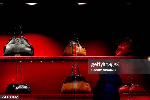 Women's luxury stiletto bags manufactured by Gucci, sit on display at the GUM department store on Red Square, in Moscow, Russia on October 31, 2018.