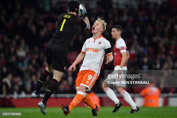 Blackpool's English striker Mark Cullen reacts after failing to scoreduring the English League Cup football match between West Ham United and...
