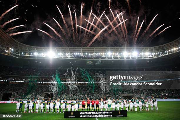 Players of Palmeiras and of Boca Juniors line up for the national anthe before the match for the Copa CONMEBOL Libertadores 2018 at Allianz Parque...