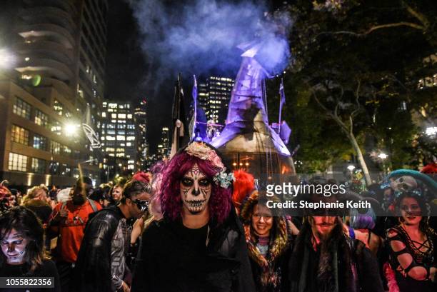 People in costumes participate in the annual Village Halloween parade on Sixth Avenue on October 31, 2018 in New York City.