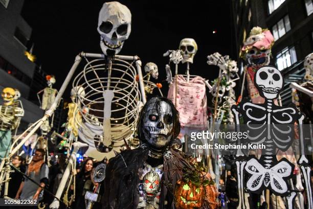 People in costumes participate in the annual Village Halloween parade on Sixth Avenue on October 31, 2018 in New York City.