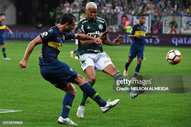 Deyverson of Brazil's Palmeiras, vies for the ball with Carlos Izquierdoz of Argentina's Boca Juniors, during their 2018 Copa Libertadores semifinal...