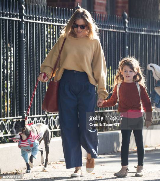 Sienna Miller and Marlowe Ottoline Layng Sturridge are seen on October 31, 2018 in New York City.