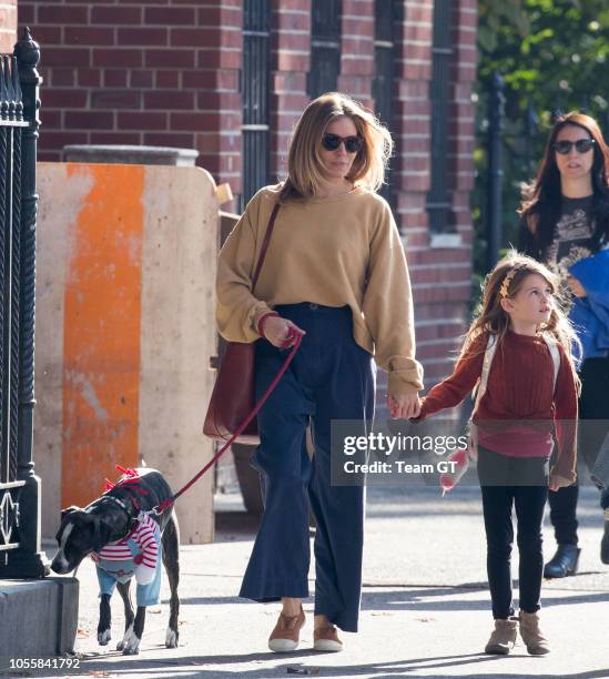 Sienna Miller and Marlowe Ottoline Layng Sturridge are seen on October 31, 2018 in New York City.
