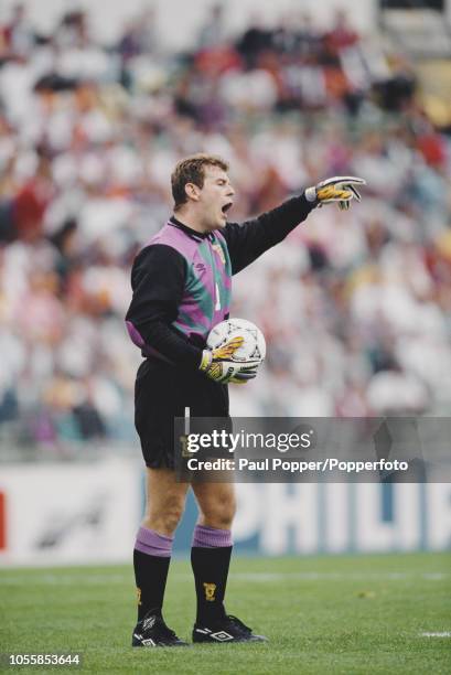 English born Scottish professional footballer Andy Goram, goalkeeper with Rangers FC, pictured in action playing for the Scotland national team in...