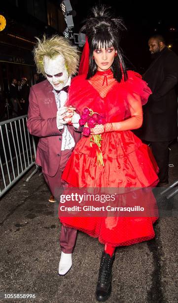 Model Bella Hadid and singer The Weeknd are seen leaving Heidi Klum's 19th Annual Halloween Party at Lavo NYC on October 31, 2018 in New York City.