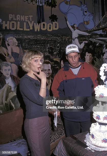 Drew Barrymore and Adam Sandler during "The Wedding Singer" New York City Premiere - After Party at Planet Hollywood in New York City, New York,...