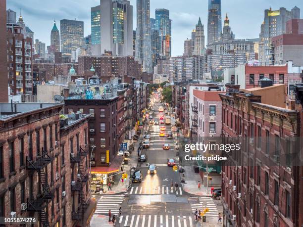 lower manhattan cityscape - chinatown - wall street nyc stock pictures, royalty-free photos & images