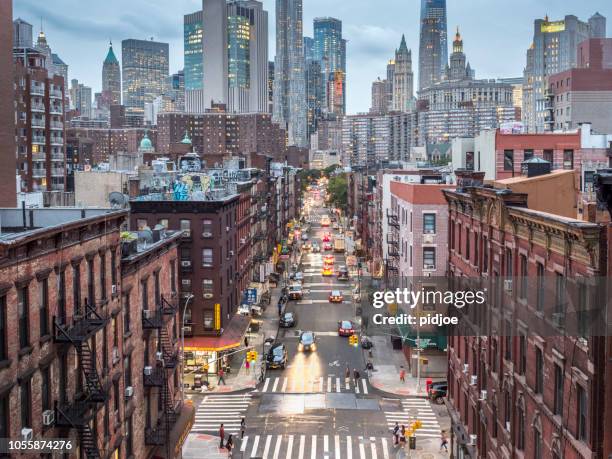 lower manhattan cityscape - chinatown - street dusk stock pictures, royalty-free photos & images