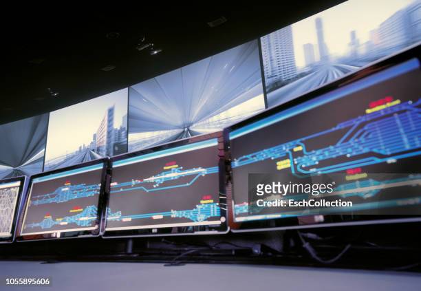 railway control room with live camera feed from trains - sala di controllo foto e immagini stock
