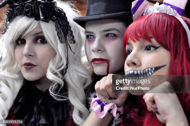 Young costumed men celebrate Halloween in Sao Paulo, Brazil on Wednesday night 31 October 2018.