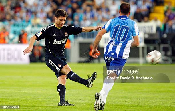 Xabi Alonso of Real Madrid in action during the La Liga match between Malaga and Real Madrid at La Rosaleda Stadium on October 16, 2010 in Malaga,...