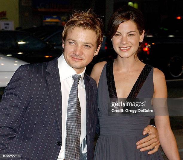 Jeremy Renner and Michelle Monaghan during Warner Bros. Pictures' "North Country" Los Angeles Premiere - Arrivals at Grauman's Chinese Theatre in...