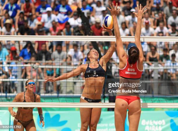 Mariia Bocharova of Russia blocks Claudia Scampoli of Italy during the Women's Volleyball Final on day 11 of Buenos Aires 2018 Youth Olympic Games at...