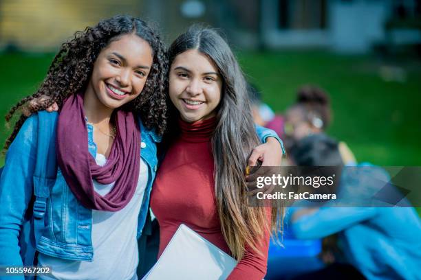 portrait of best friends in college - community college campus stock pictures, royalty-free photos & images