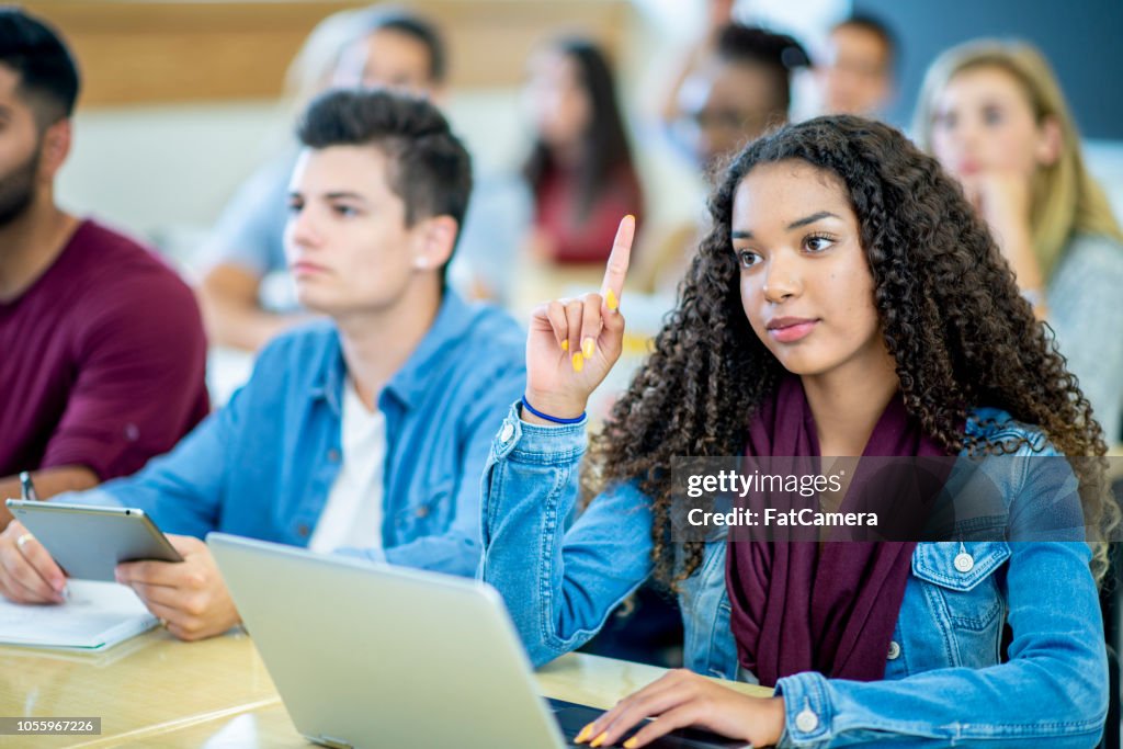 Student Answering A Question In Class High-Res Stock Photo - Getty Images
