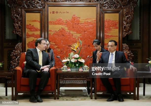 China's Premier Li Keqiang speaks with Administrator of United Nations Development Programme Achim Steiner at Zhongnanhai leadership compound on...
