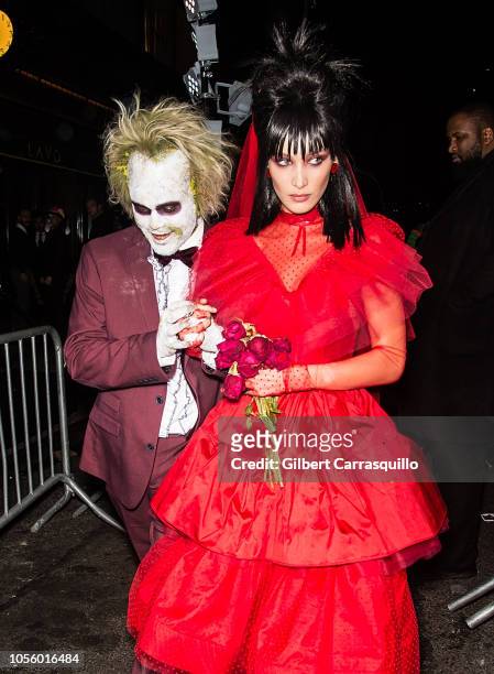 Model Bella Hadid and singer The Weeknd are seen leaving Heidi Klum's 19th Annual Halloween Party at Lavo NYC on October 31, 2018 in New York City.