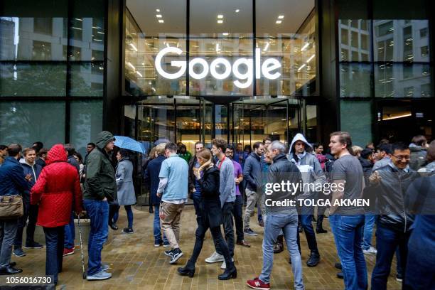 Google staff stage a walkout at the company's UK headquarters in London on November 1, 2018 as part of a global campaign over the US tech giant's...