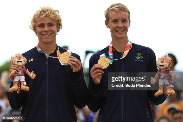 David Ahman of Seweden and Jonatan Hellvig of Sweden celebrate their gold medal in Mens Beach Volleyball during day 11 of Buenos Aires 2018 Youth...