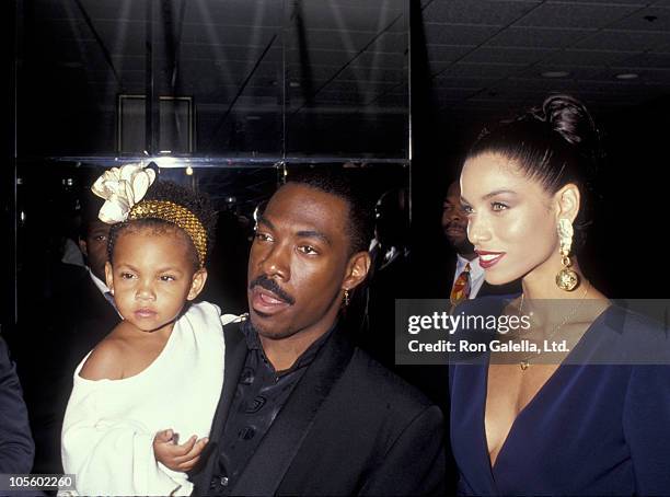 Eddie Murphy, his daughter Brea and Nicole Mitchell