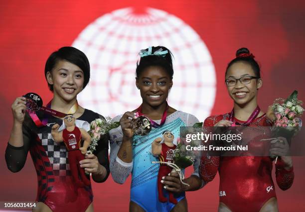 Mai Murakami of Japan Siver Medalist, Simone Biles of USA Gold Medalist and Morgan Hurd of USA Bronze Medalist celebrate after the Women's All-Round...