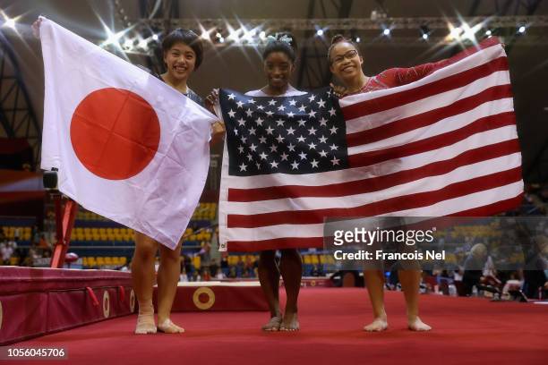 Mai Murakami of Japan Siver Medalist, Simone Biles of USA Gold Medalist and Morgan Hurd of USA Bronze Medalist celebrate after the Women's All-Round...