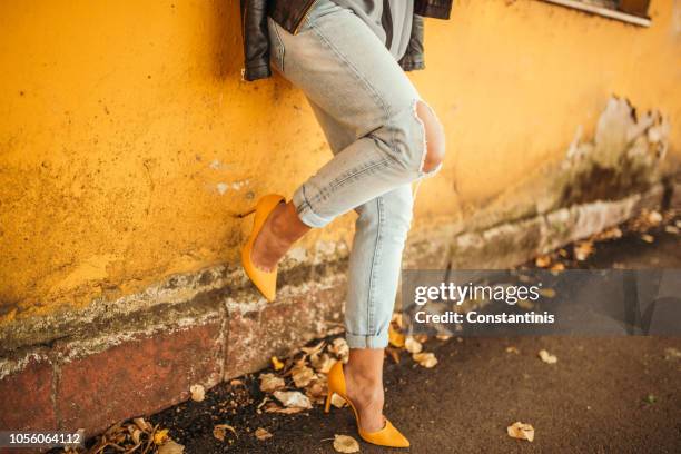 young pretty fashioned girl - high heels pain stock pictures, royalty-free photos & images