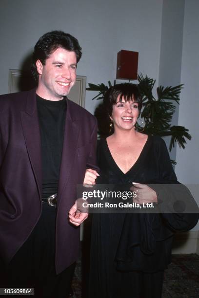 John Travolta and Liza Minnelli during Cine-Grill Opening Night at Hollywood Roosevelt Hotel in Hollywood, California, United States.