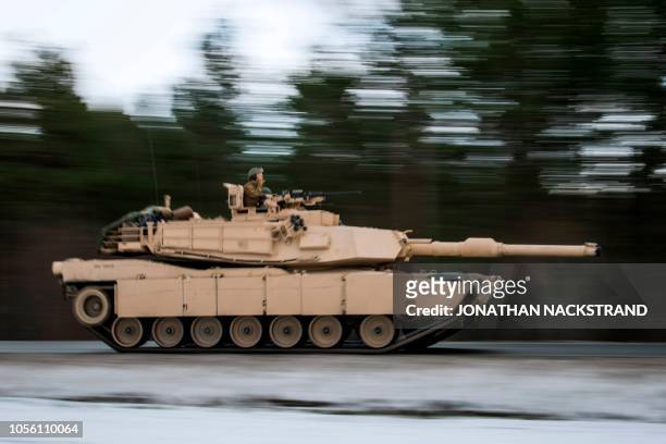 Marines drive an M1 Abrams to take part in an exercise to capture an airfield as part of the Trident Juncture 2018, a NATO-led military exercise, on...
