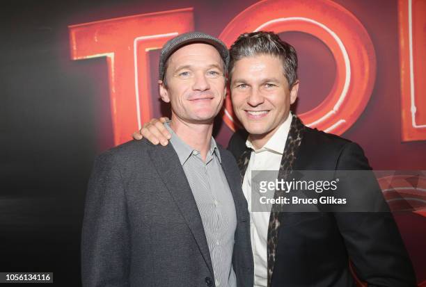 Neil Patrick Harris and husband David Burtka pose at the opening night of "Torch Song" on Broadway at The 2nd Stage Helen Hayes Theater on November...
