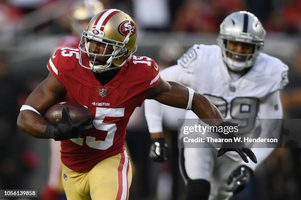 Pierre Garcon of the San Francisco 49ers runs after a catch against the Oakland Raiders during their NFL game at Levi's Stadium on November 1, 2018...