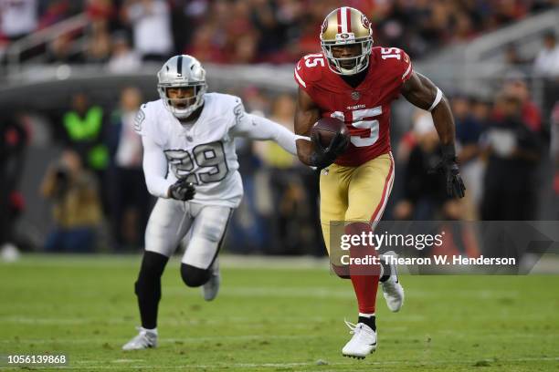 Pierre Garcon of the San Francisco 49ers runs after a catch against the Oakland Raiders during their NFL game at Levi's Stadium on November 1, 2018...