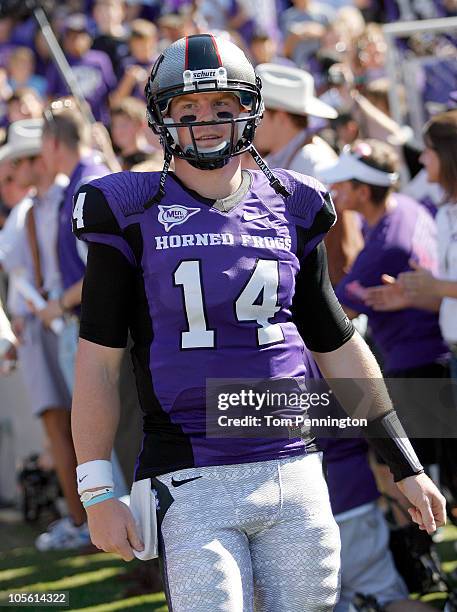 Quarterback Andy Dalton of the Texas Christian University Horned Frogs walks on the field against the Brigham Young University Cougars at Amon G....