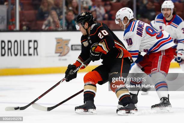 Pontus Aberg of the Anaheim Ducks skates away from Vladislav Namestnikov of the New York Rangers during the first period of a game at Honda Center on...