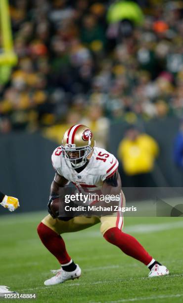 Pierre Garcon of the San Francisco 49ers makes a reception during the game against the Green Bay Packers at Lambeau Field on October 15, 2018 in...