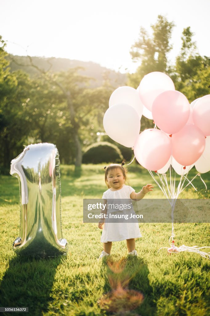Happy baby girl celebrating a birthday