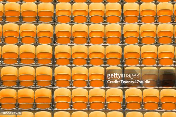 seats at the stadium - football stadium background stock pictures, royalty-free photos & images