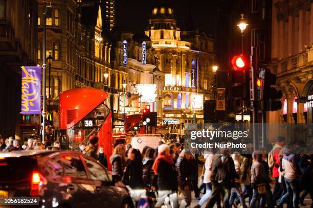 Crowds and traffic pack the 'Theatreland' end of Shaftesbury Avenue in the West End of London, England, on November 1, 2018.