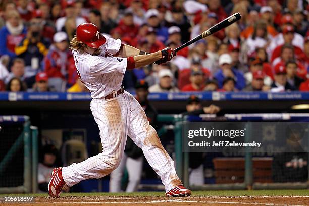 Jayson Werth of the Philadelphia Phillies hits a two-run home run in the sixth inning against the San Francisco Giants in Game One of the NLCS during...