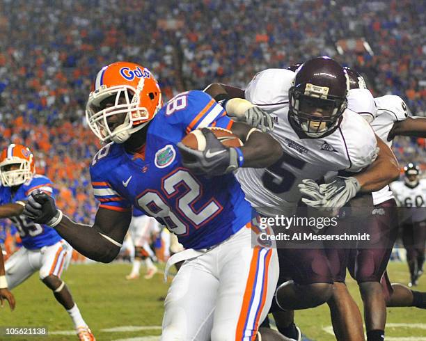 Wide receiver Omarius Hines of the Florida Gators rushes upfield with a pass against the Mississippi State Bulldogs October 16, 2010 Ben Hill Griffin...