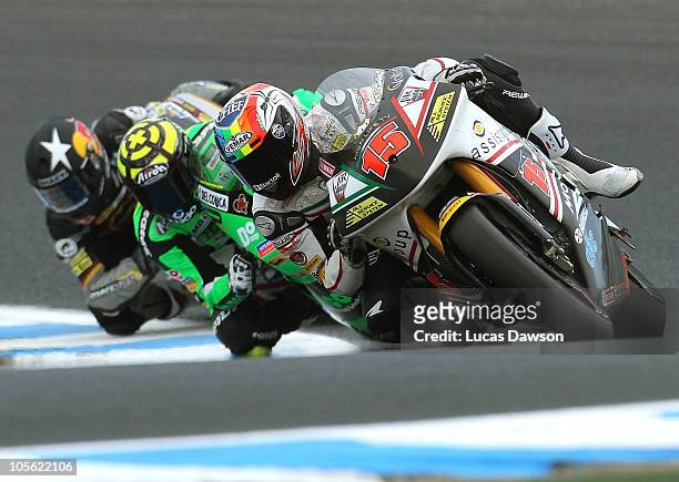 Alex De Angelis of San Marino riding JIR Moto2 rides during the Moto2 during the Australian MotoGP, which is round 16 of the MotoGP World...