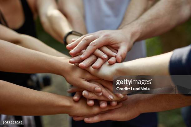 real friends stick together - clique stock pictures, royalty-free photos & images