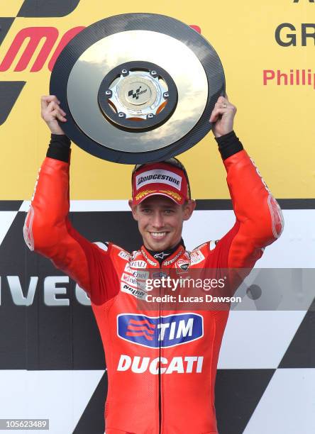 Casey Stoner of Australia rider of the Ducati Marlboro Team celebrates winning the Australian MotoGP, which is round 16 of the MotoGP World...
