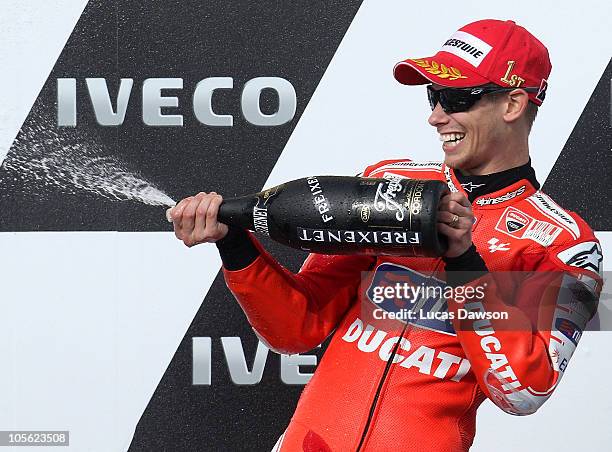Casey Stoner of Australia rider of the Ducati Marlboro Team celebrates winning the Australian MotoGP, which is round 16 of the MotoGP World...